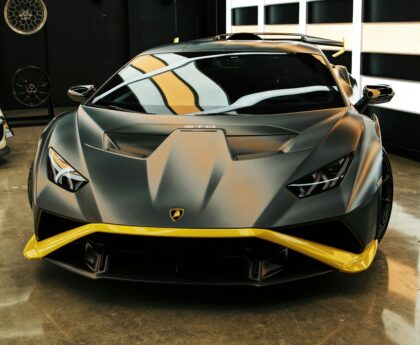 Explore the futuristic design of a Lamborghini Huracan in a stylish Los Angeles showroom.